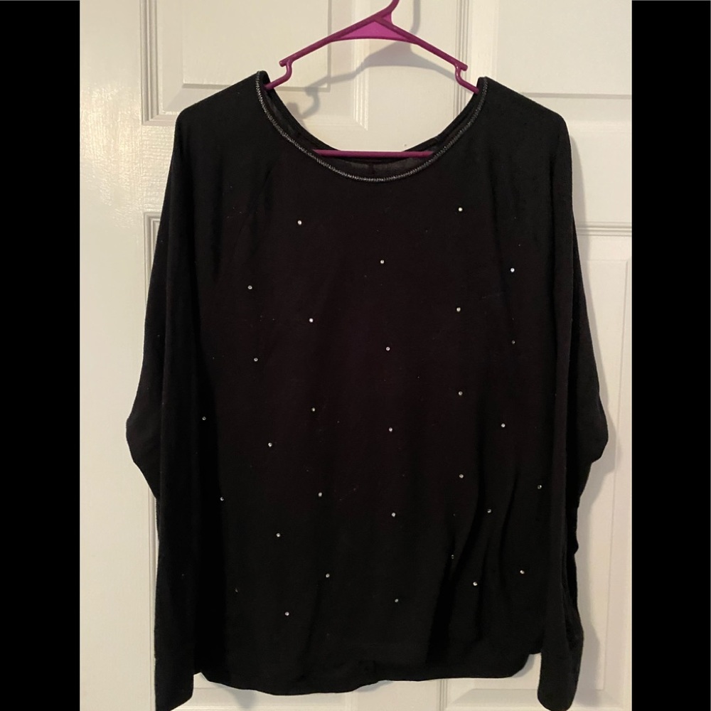 Black sweater. rhinestone embellishments on front.